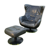 Egg chair style armchair and its ottoman.