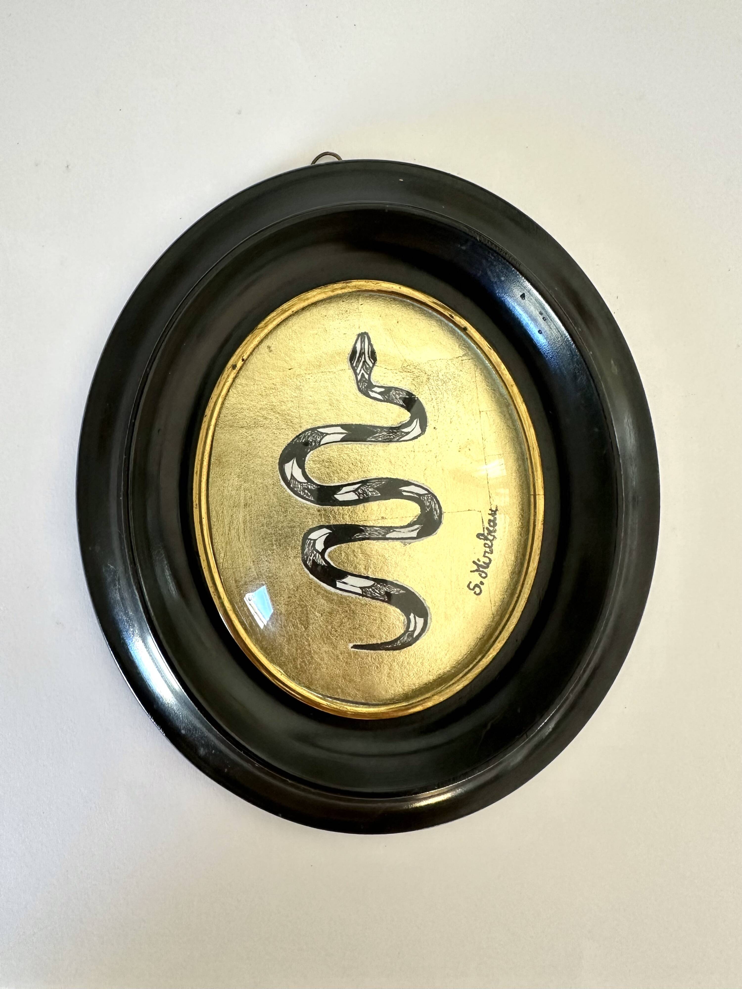 Curved glass snake frame