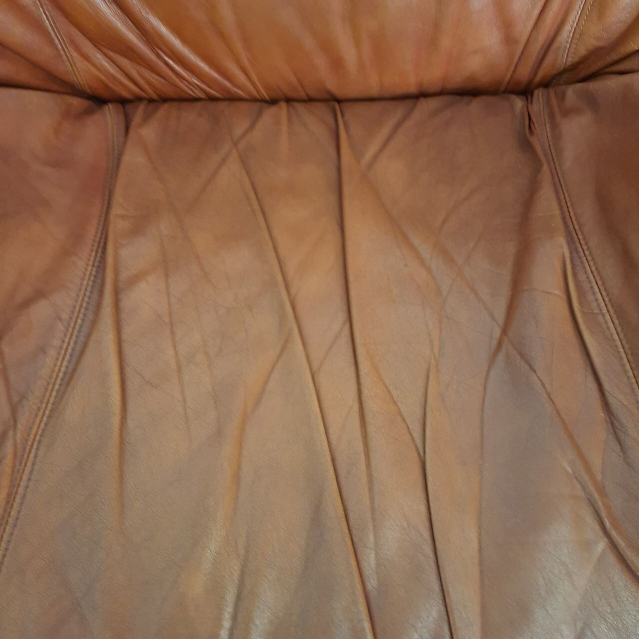 Four vintage armchairs, leather and fabric, 70s