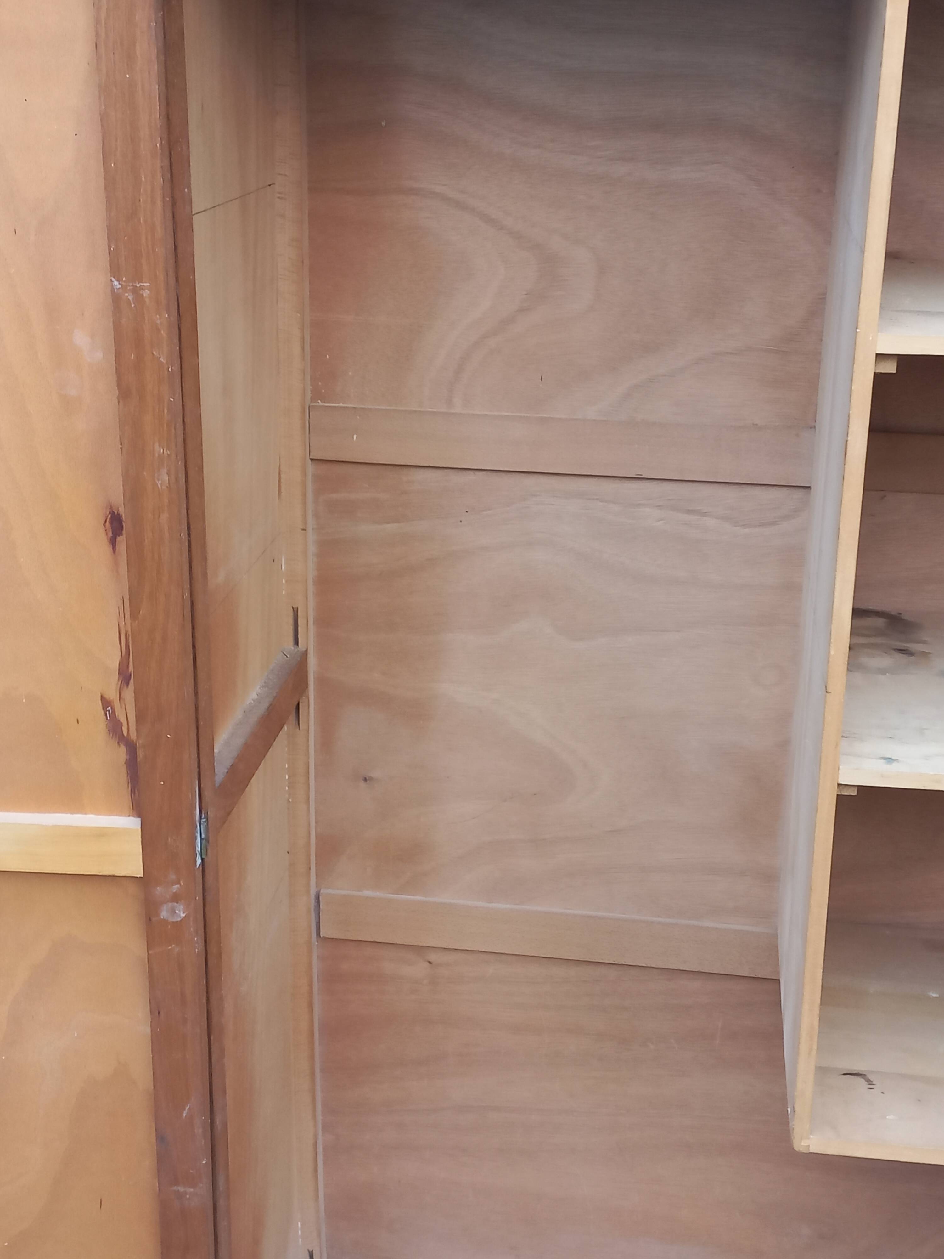 Vintage oak wardrobe with metal legs from the 1950s.