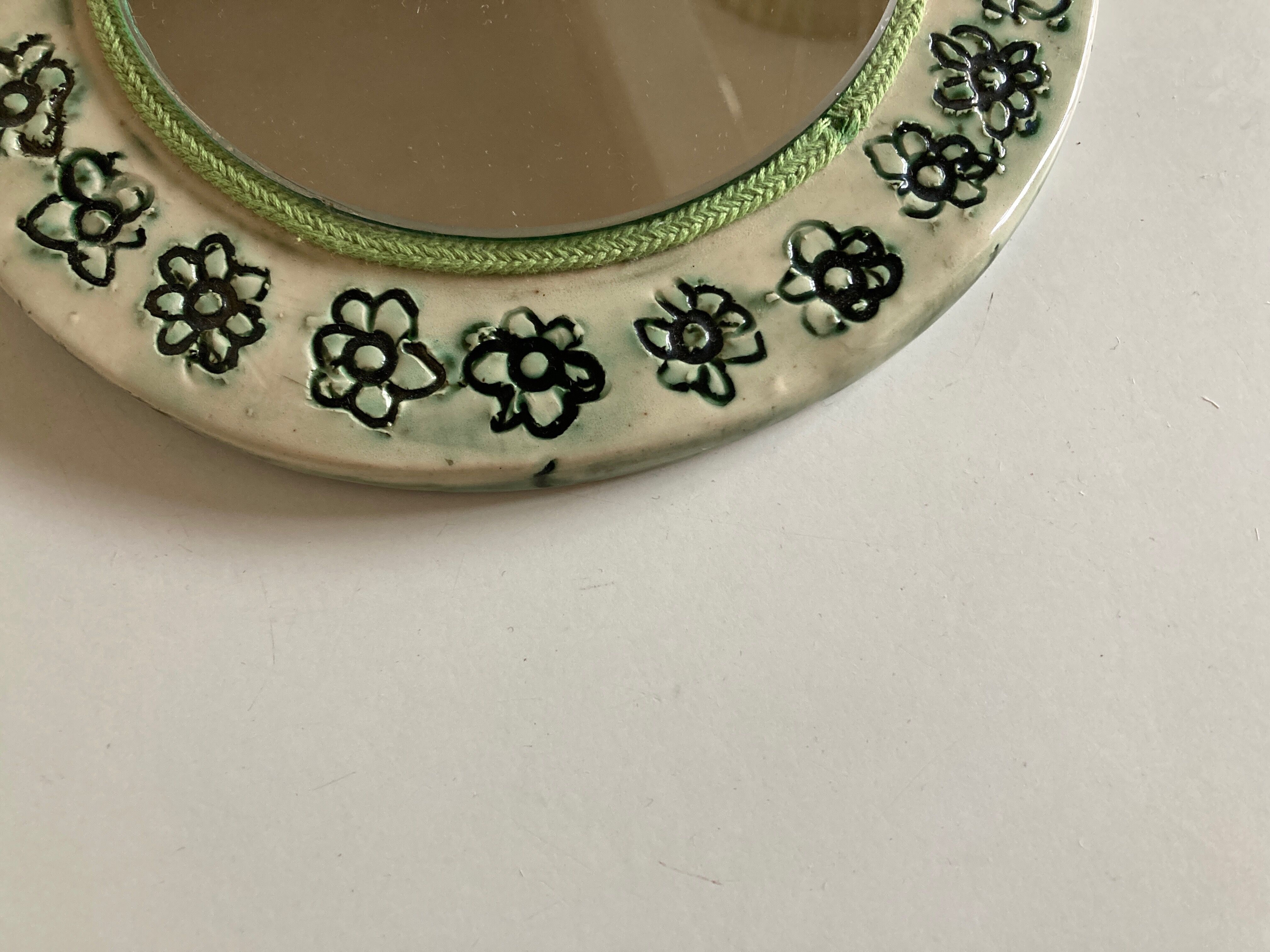 Incised ceramic mirror with flowers 1960