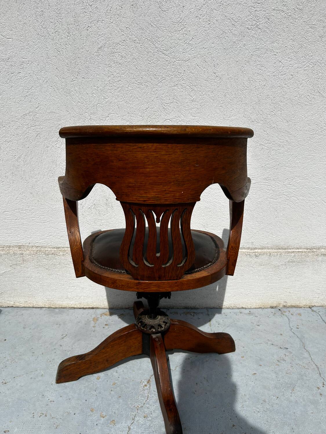 Milwaukee Chair Co. swivel office chair – leather and wood – circa