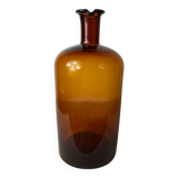 Large amber glass apothecary bottle with spout