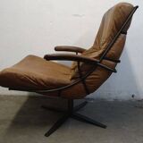 Fauteuil pivotant industriel en cuir cognac
