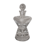 Wine decanter with cork on crystal base