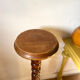 Antique pedestal table with a twisted column.