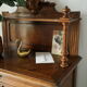 Louis XVI style music cabinet in walnut, 20th century.