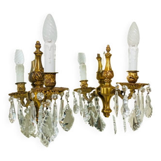 St Louis XV wall lights in gilded bronze with pendants from the mid-20th century.
