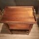 Sideboard with four drop-leaves