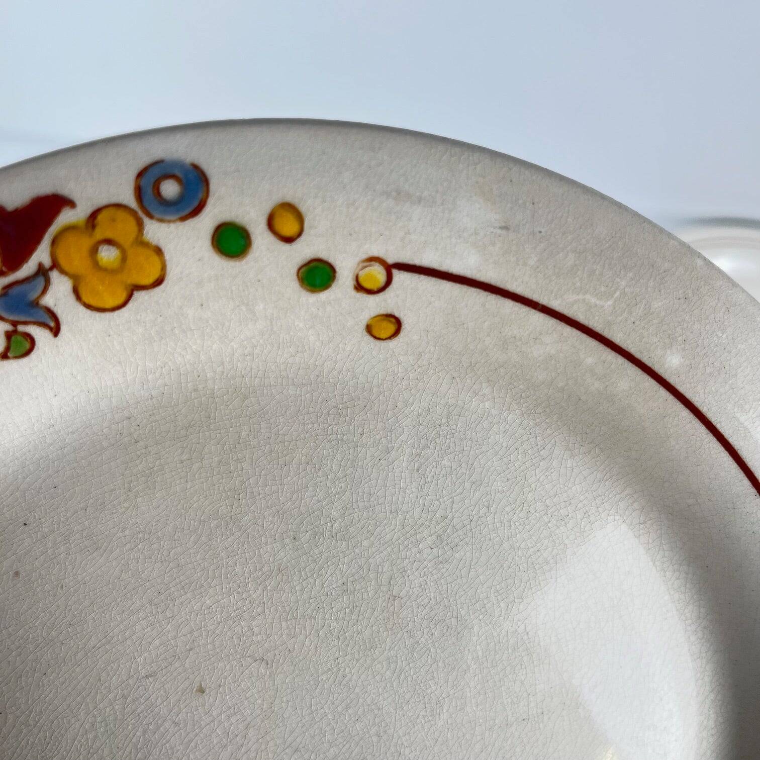 Set of 5 dessert plates Longwy, early 20th century, floral decoration.