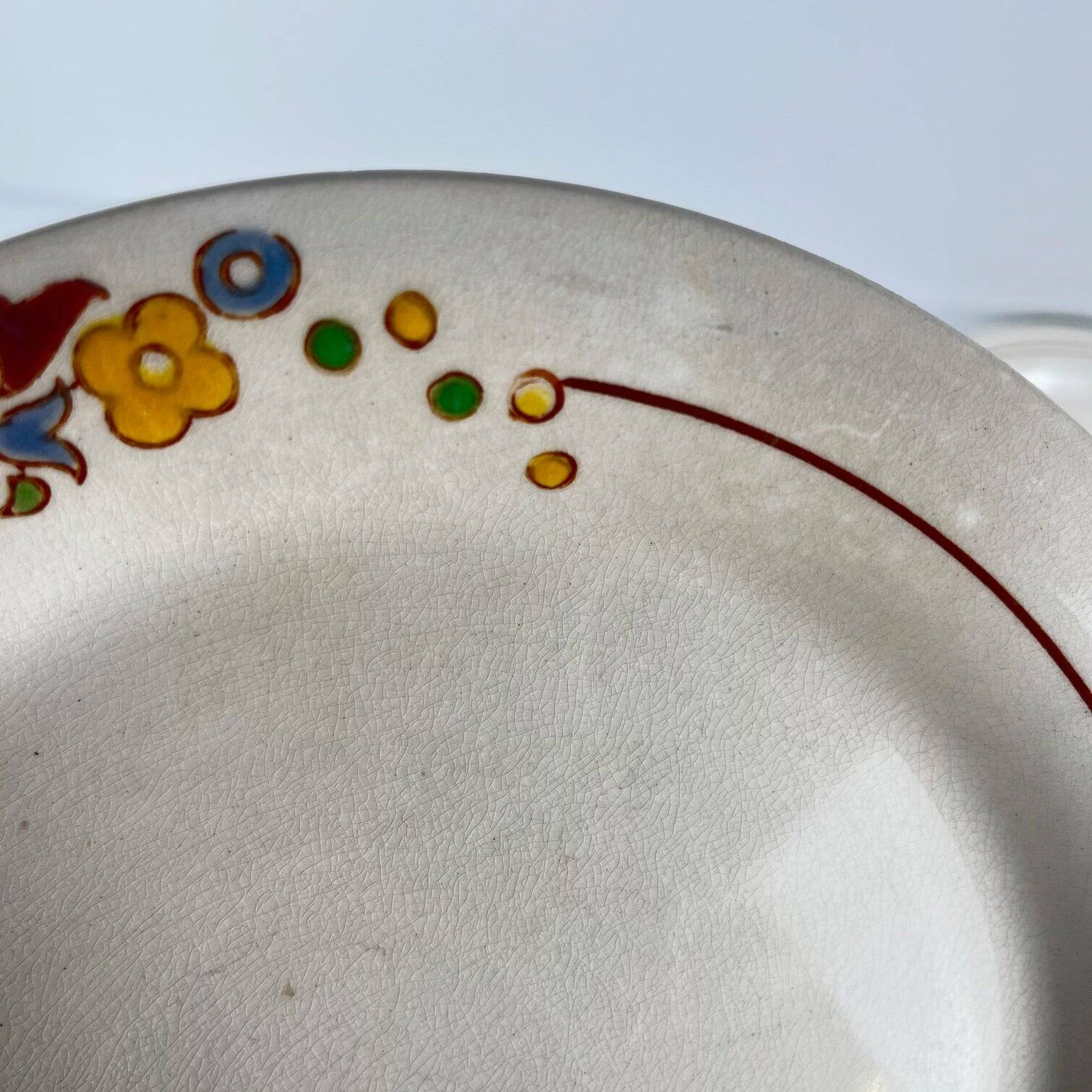 Set of 5 dessert plates Longwy, early 20th century, floral decoration.