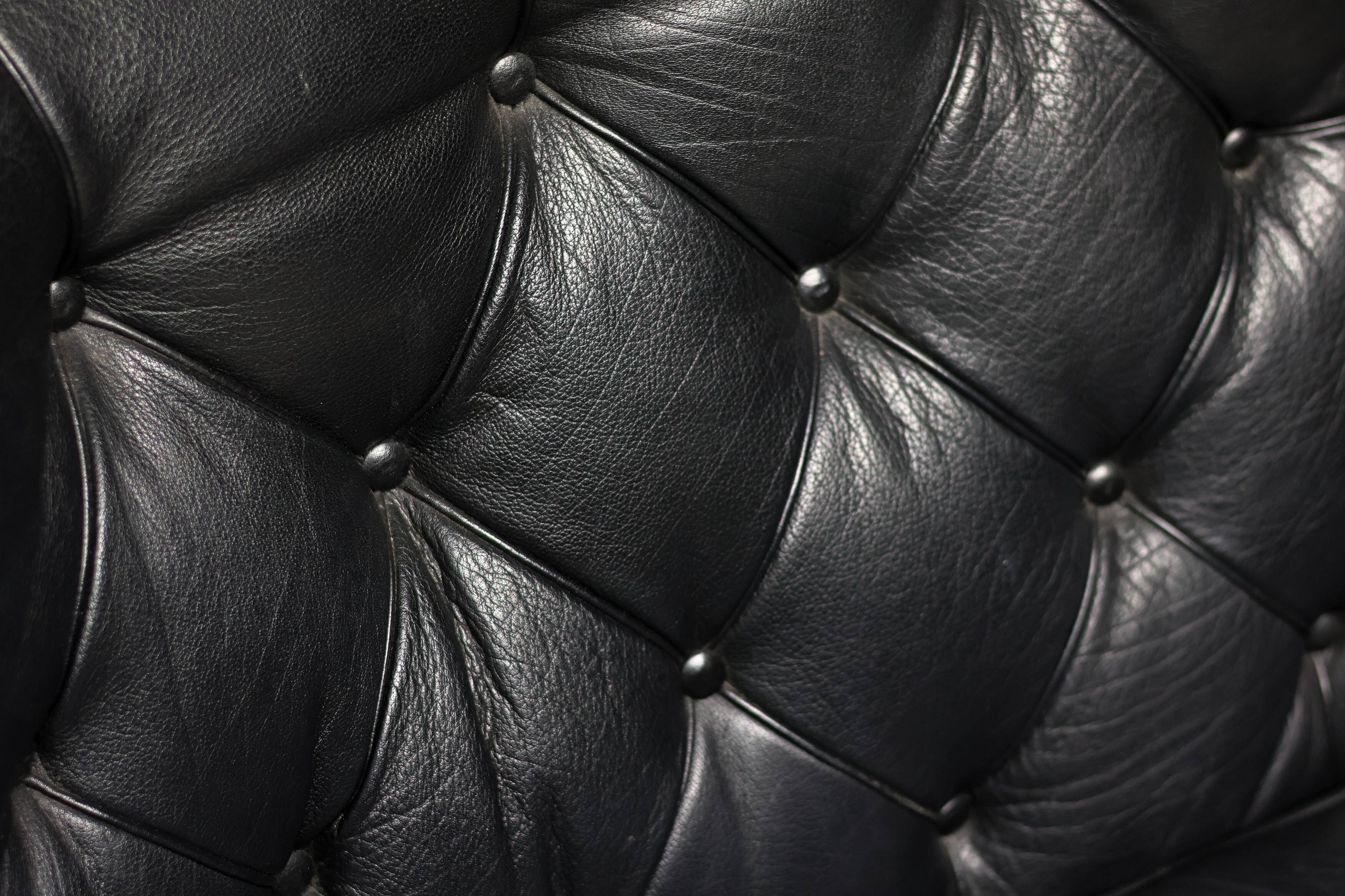 Three-seater sofa "Jupiter" in black leather by Arne Norell, Sweden, 1960.