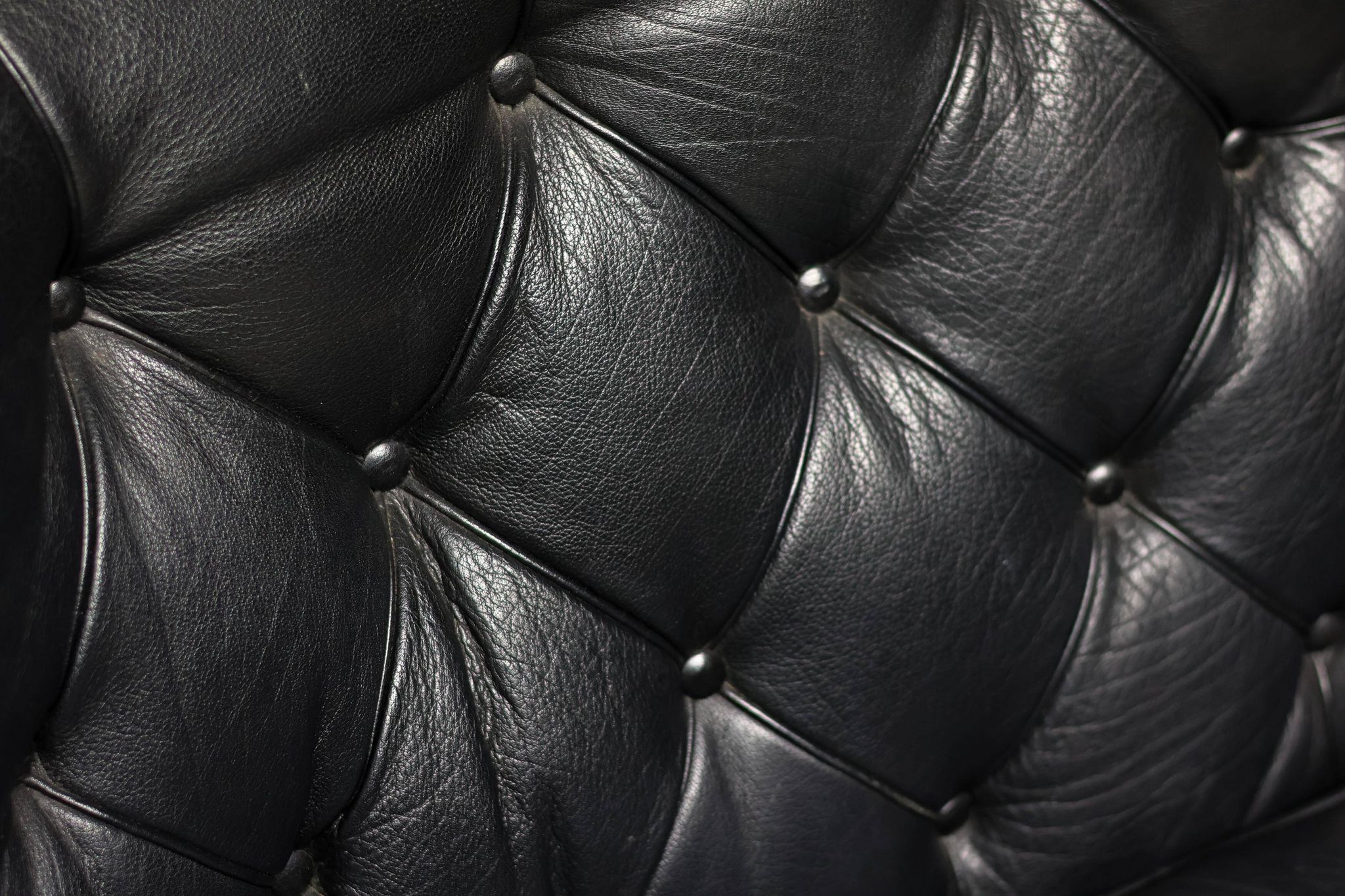 Three-seater sofa "Jupiter" in black leather by Arne Norell, Sweden, 1960.