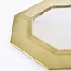 Old golden octagonal mirror, in brass