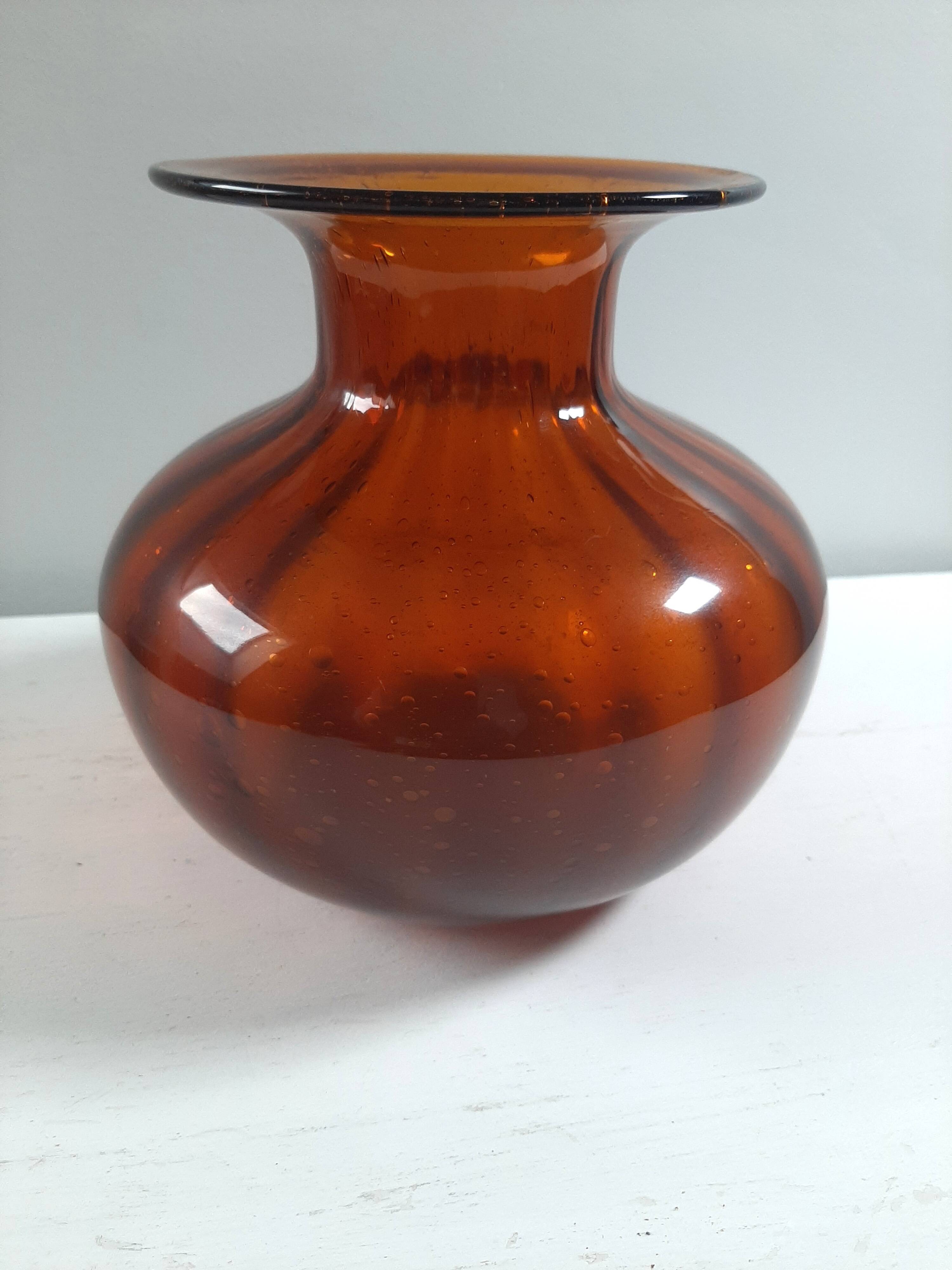 Orange vase in bubbled glass