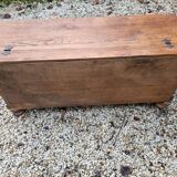Wooden chest with lion paws