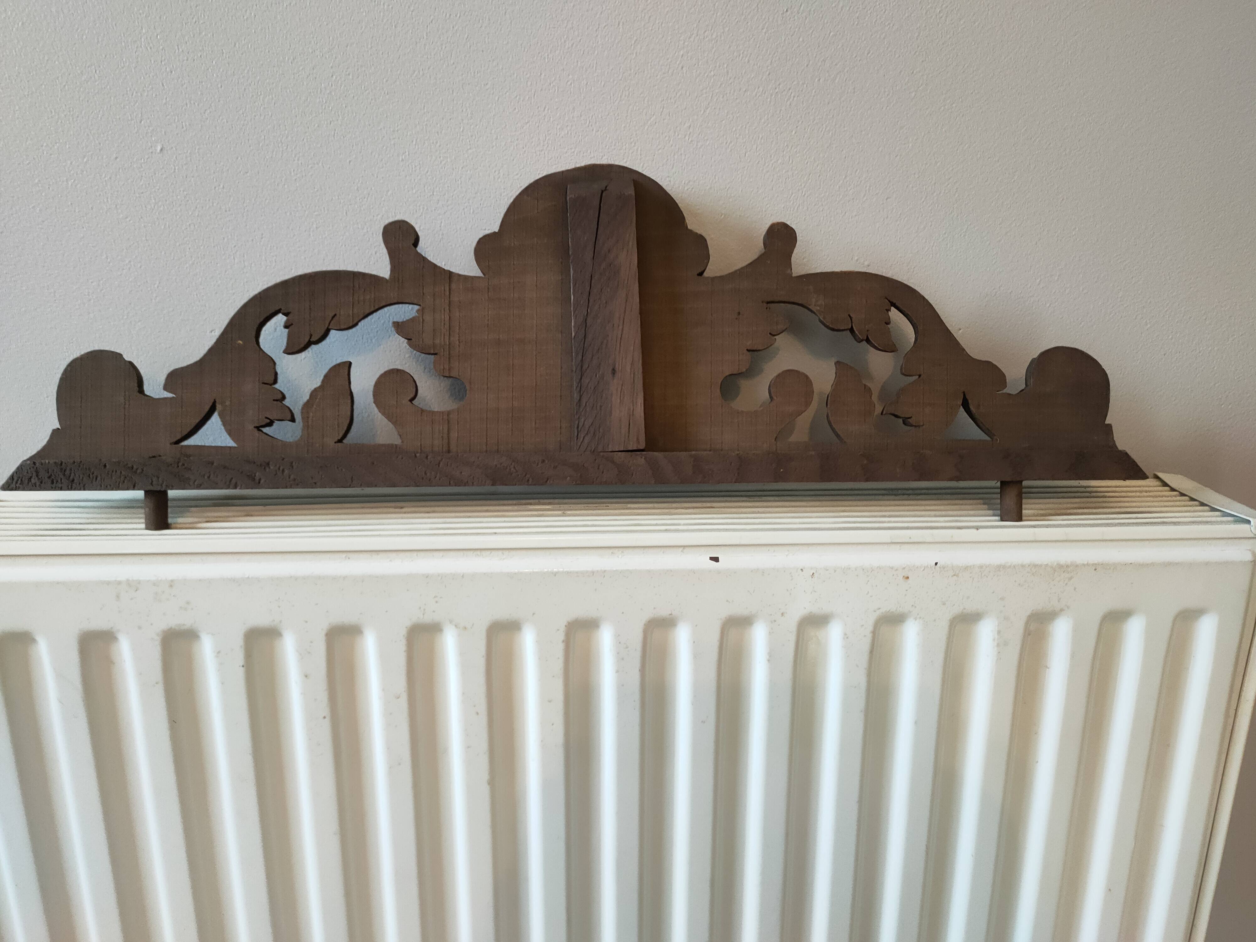 Old carved wooden pediment