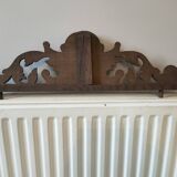 Old carved wooden pediment