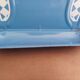 Old door kitchen utensils blue enamelled sheet metal