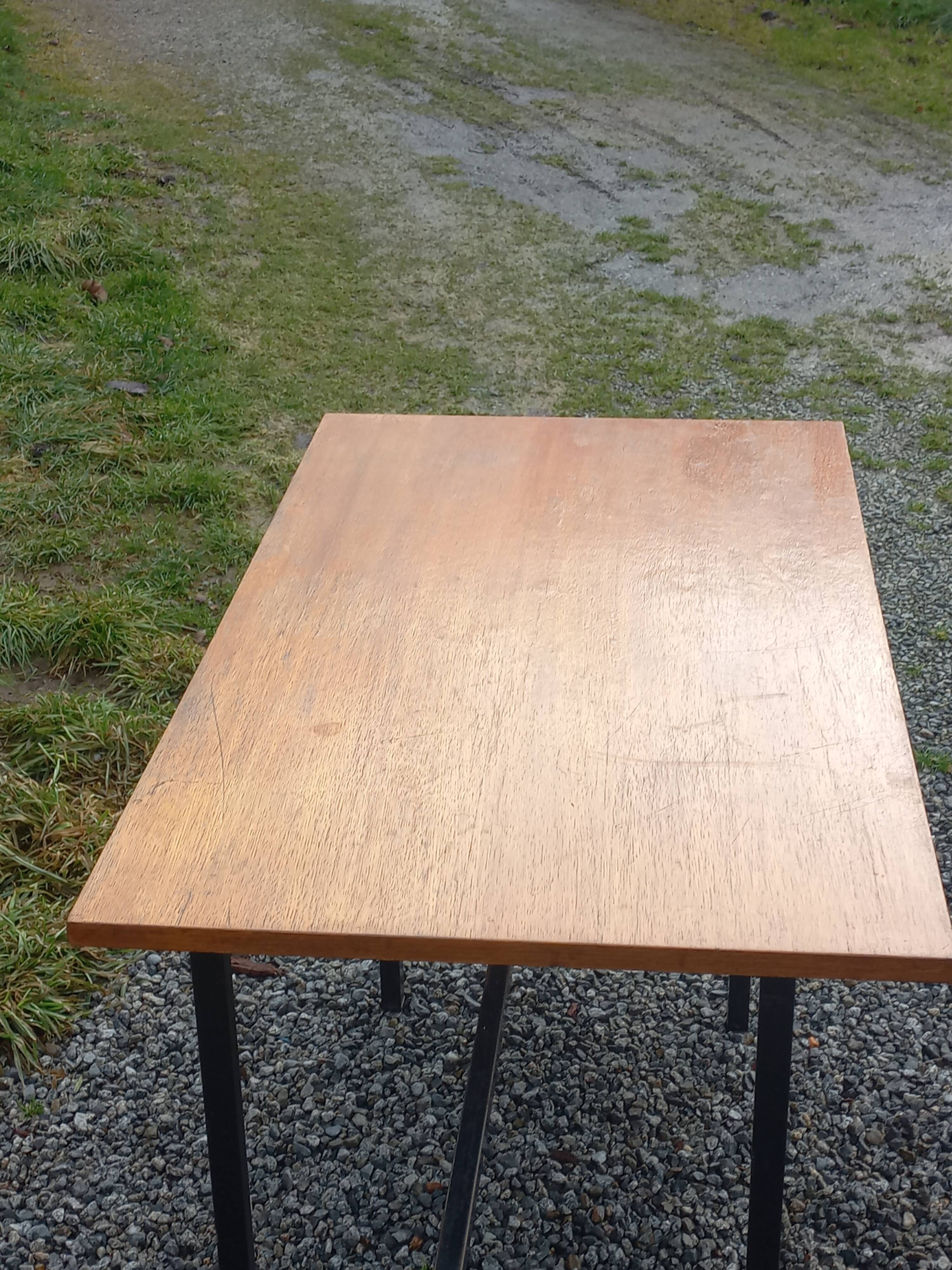 Vintage oak desk with a metallic base from the 1960s.