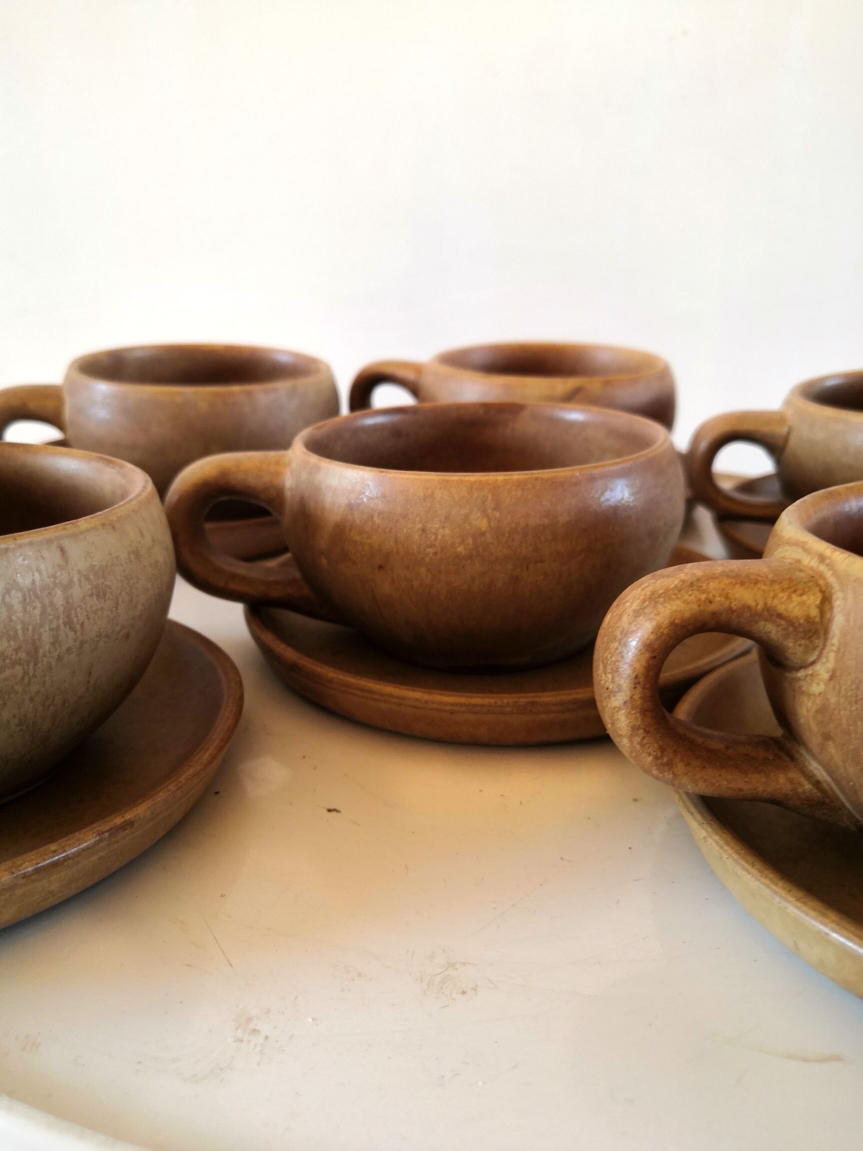 6 saucers and coffee cups in 70s design stoneware