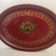 Old oval plate in painted red tin - floral decoration - early 20th century -