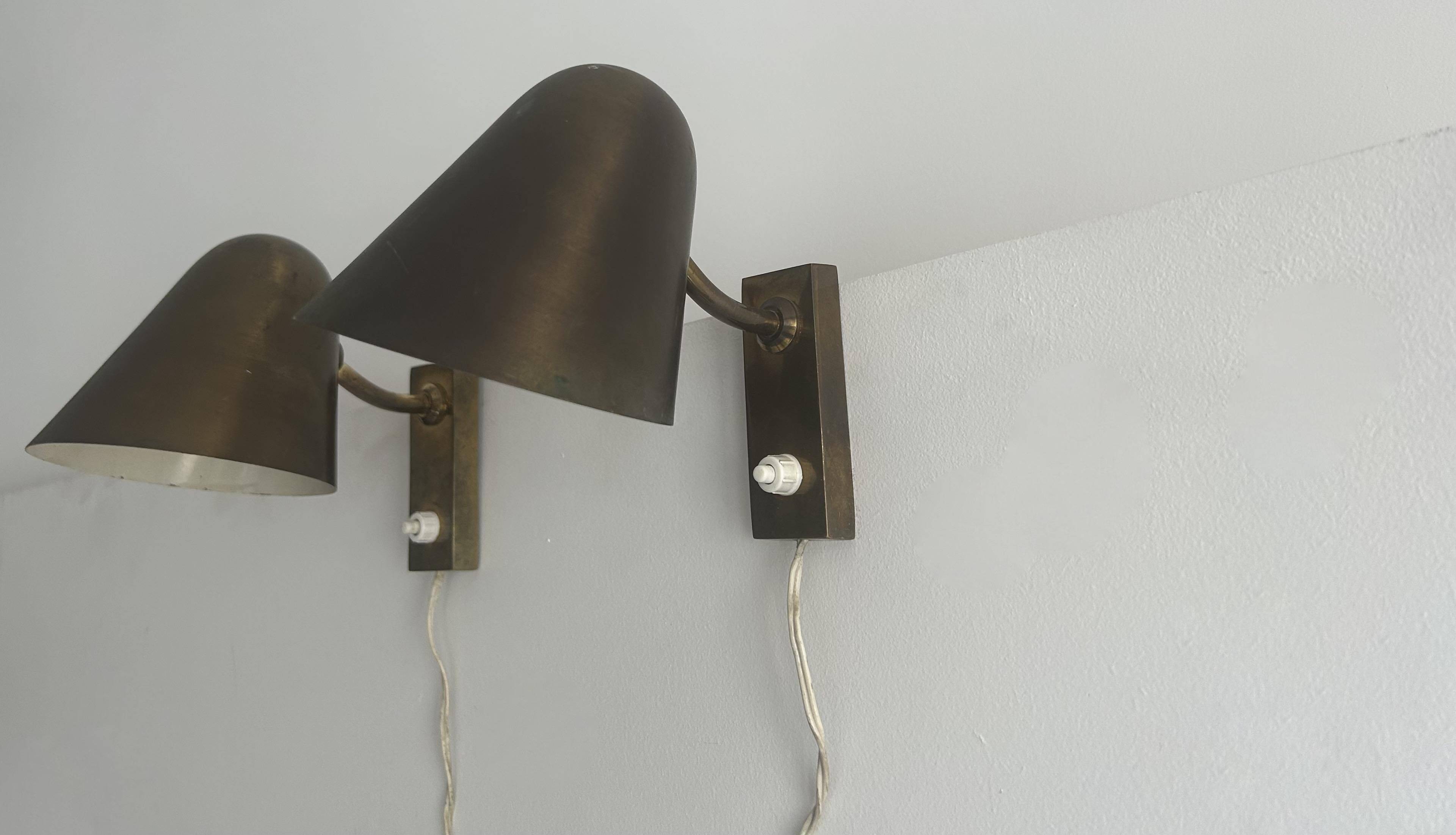 Pair of vintage adjustable wall lights, solid brass, France 1940