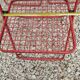 Set of 5 vintage red metal mesh folding chairs, Ted Net style.