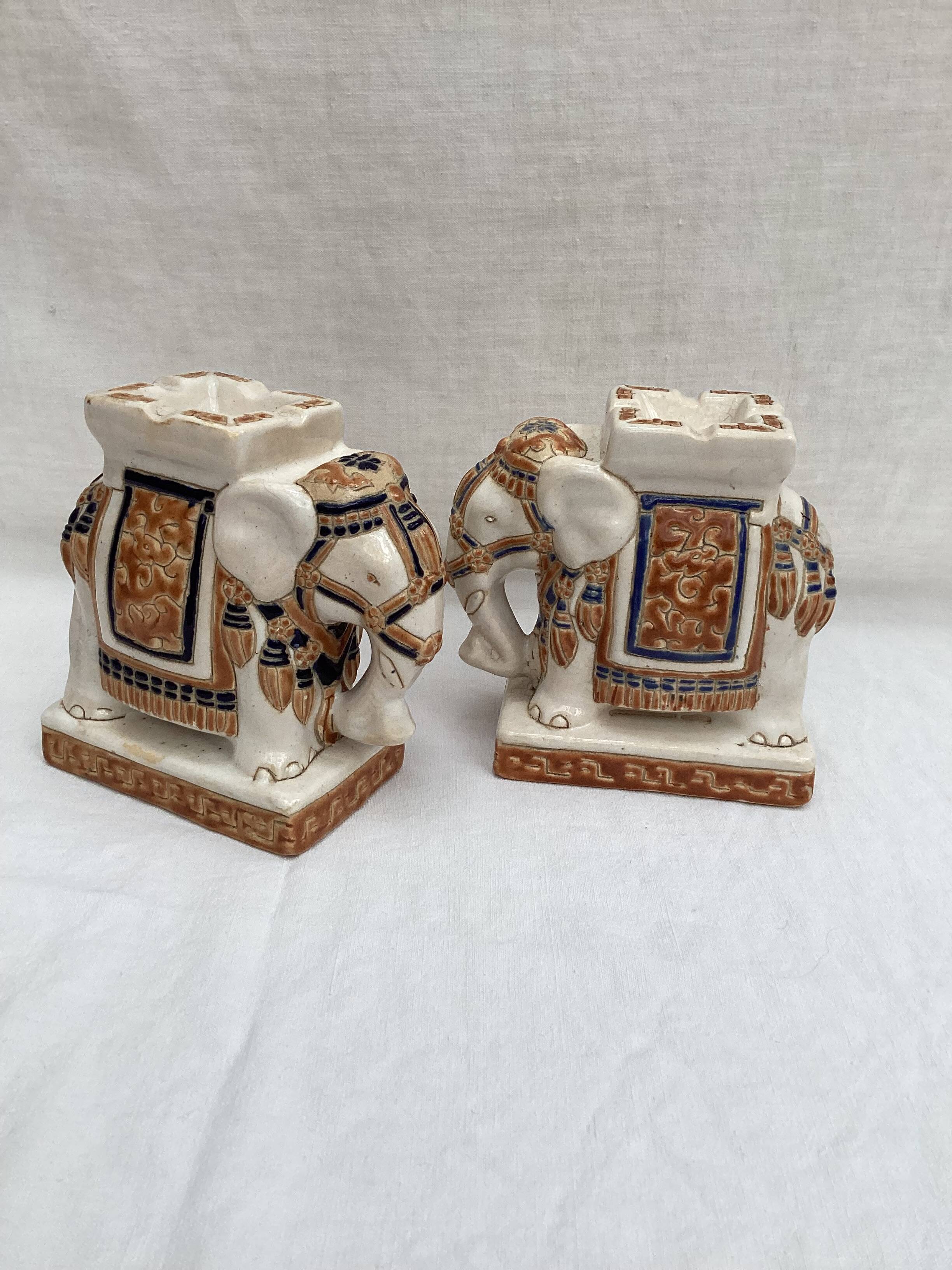 Pair of ceramic elephant ashtrays dimensions: height -14cm- width -13.5cm-