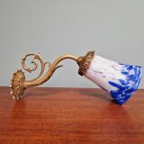 Wall light in gilded bronze and blue and white speckled glass