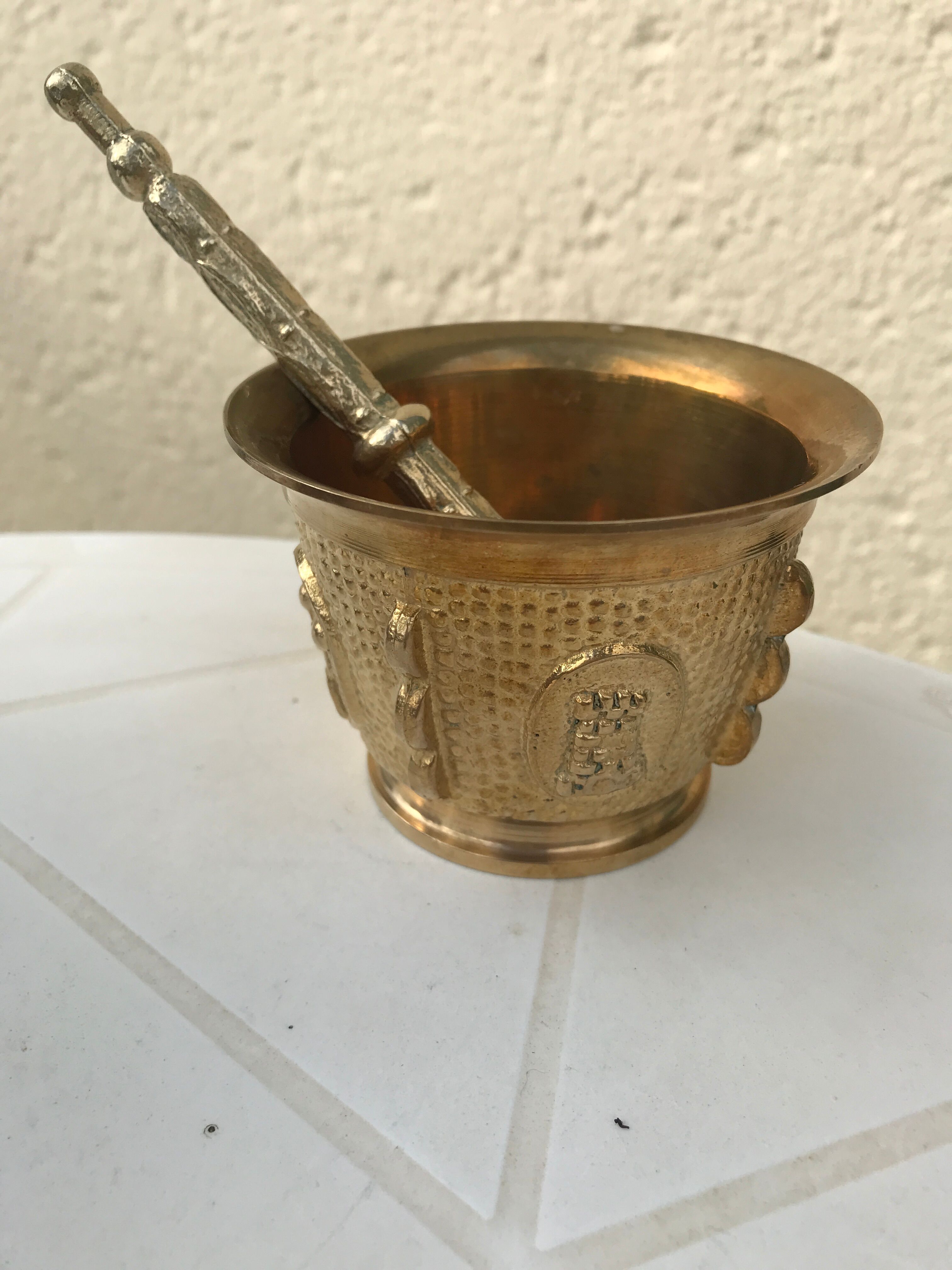 Mortar and its ancient bronze pestle