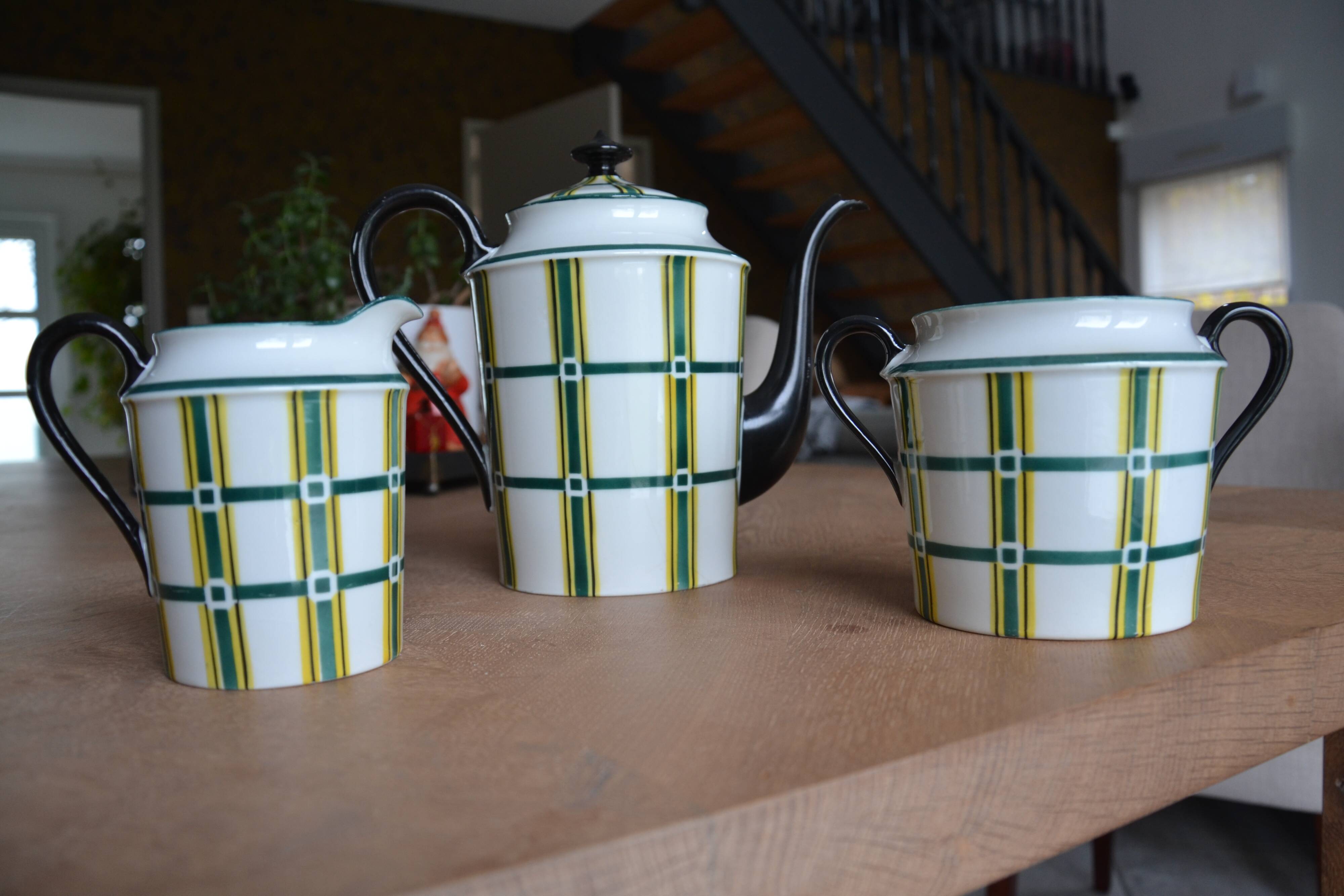 Limoges porcelain teapot, sugar bowl and milk jug