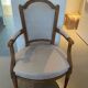 Pair of cabriolet armchairs in light grey and dark grey Louis XV style.