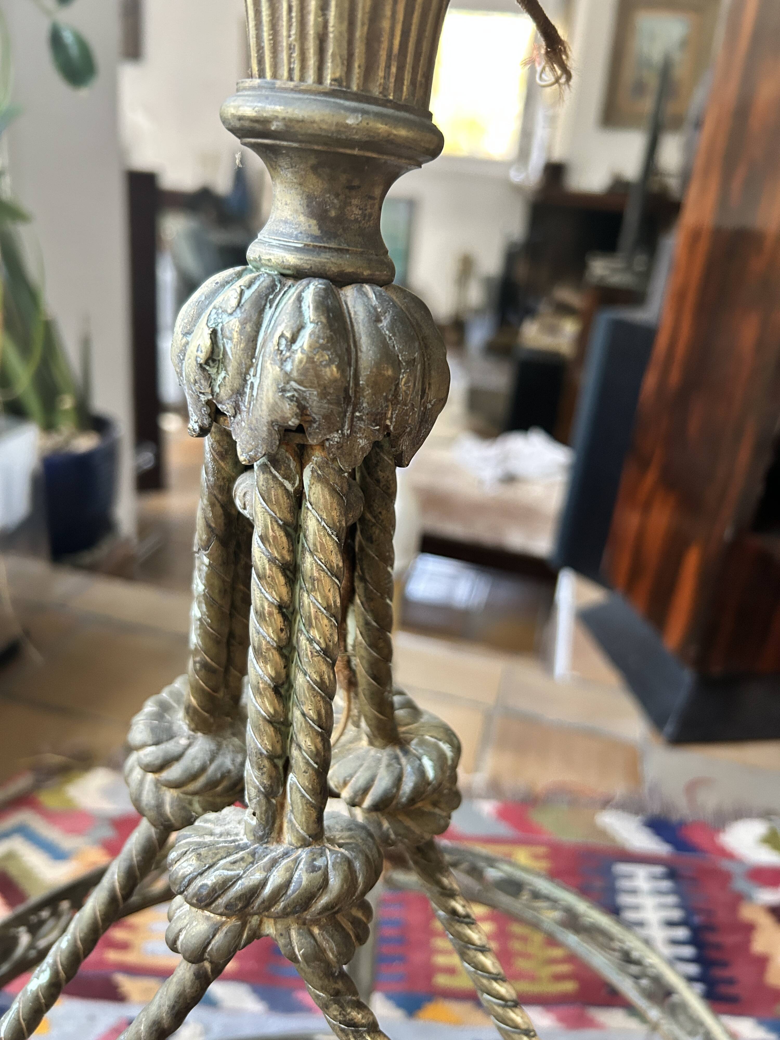 Brass chandelier from the early 20th century.