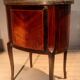Veneered tambour door chest of drawers