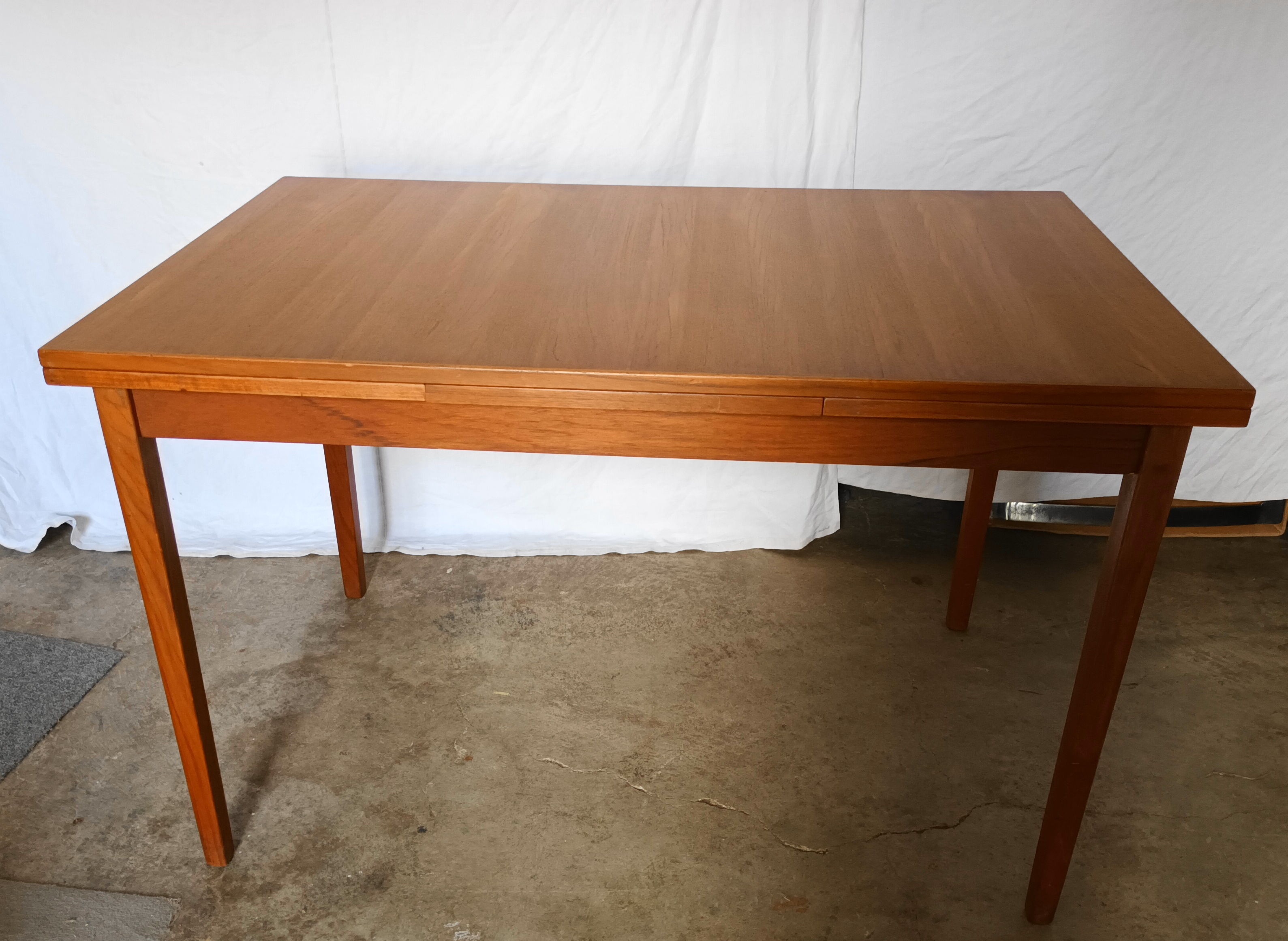 Scandinavian teak extension table from the 60s