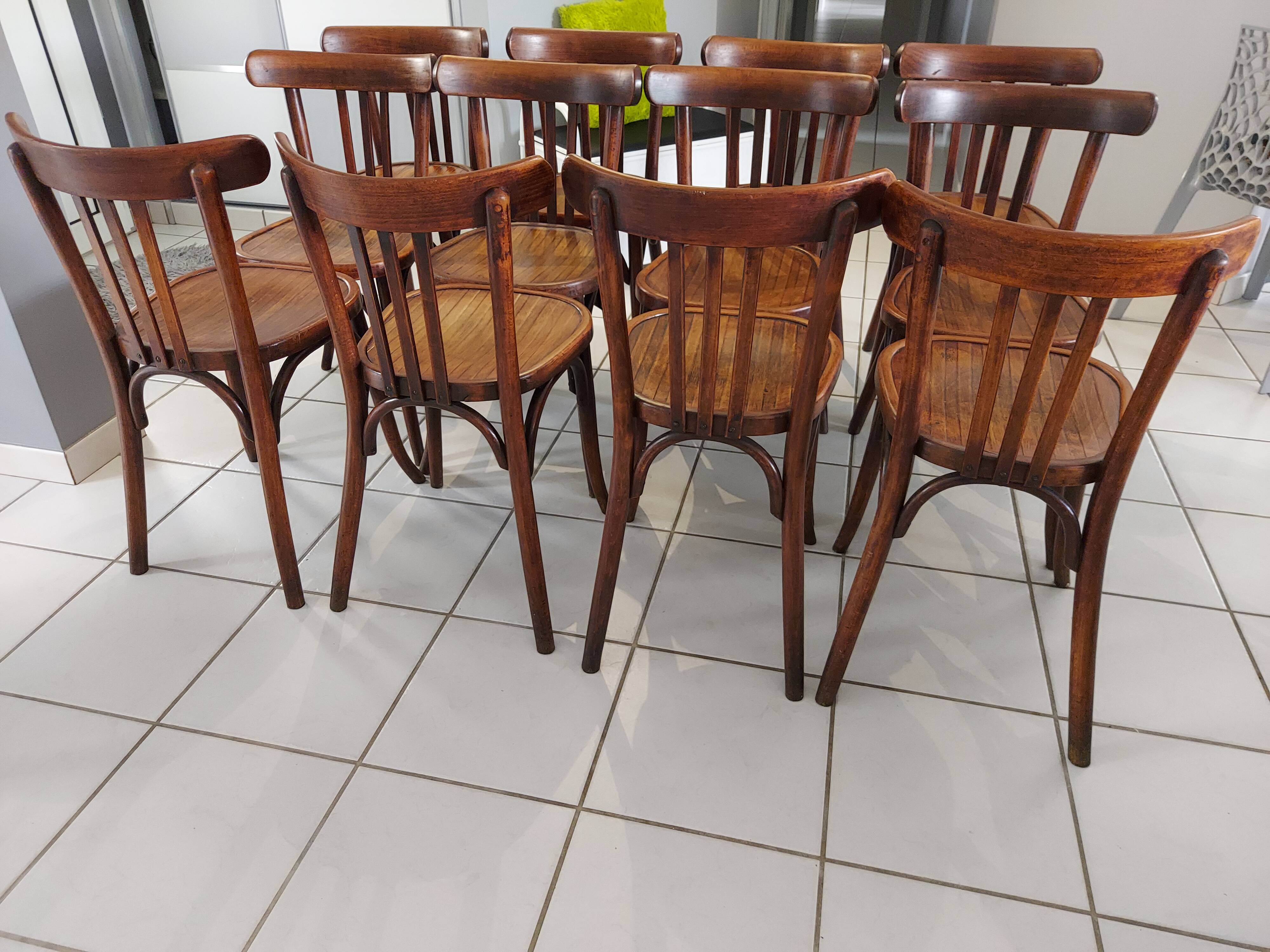 Suite of 12 chairs of bistrot Baumann 1940s