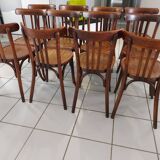 Suite of 12 chairs of bistrot Baumann 1940s