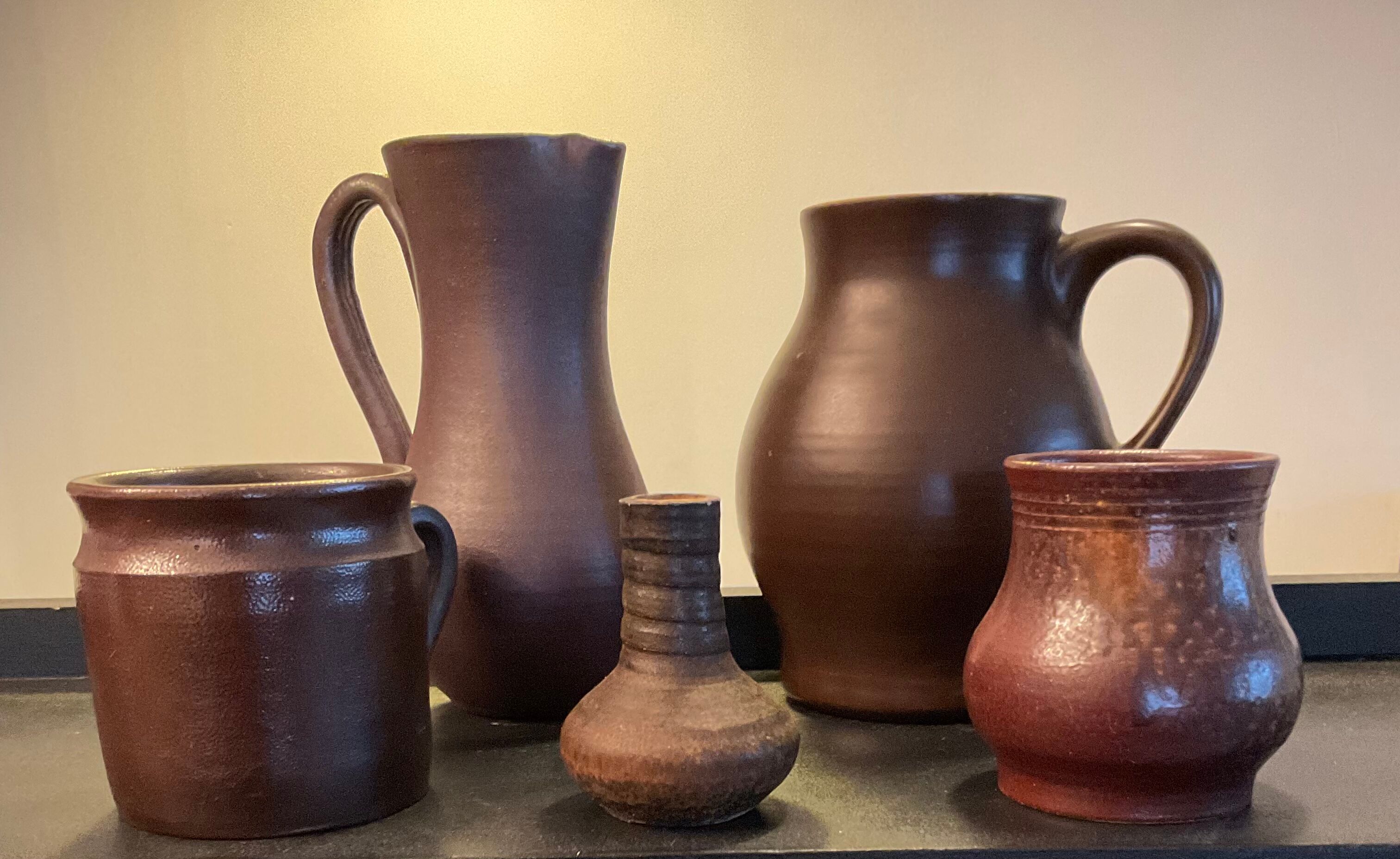 Series of 5 vintage brown ceramic vases