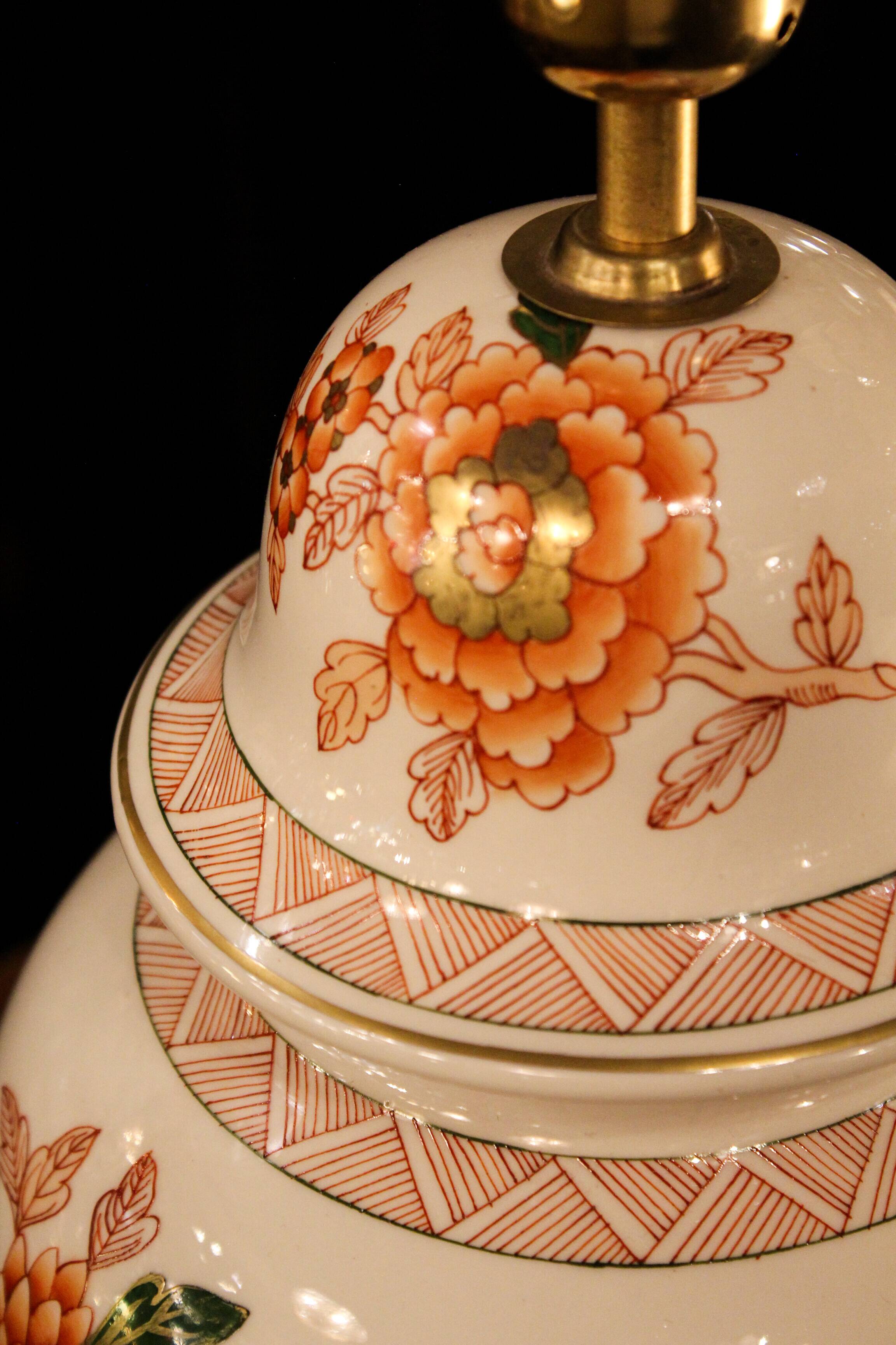 Spanish porcelain lamp hand-painted with floral patterns.