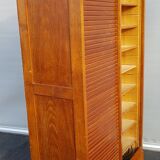 Furniture with double curtain columns 1930