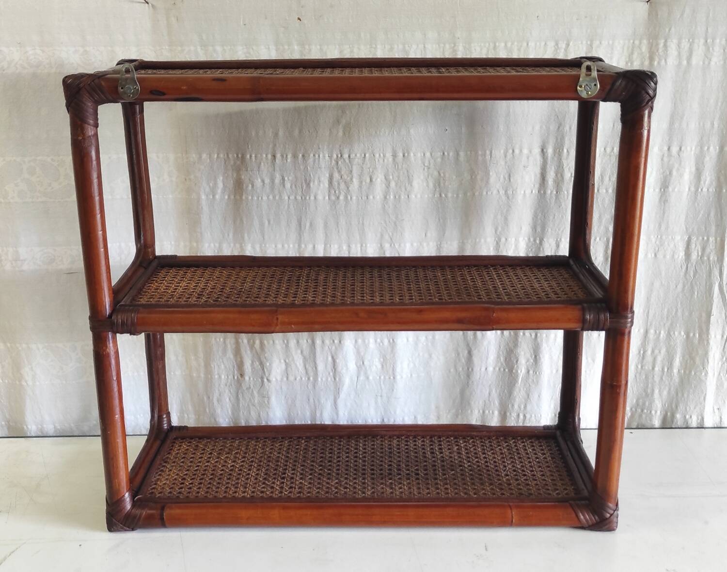 Rattan and cane wall shelf - late 20th century