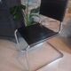 Paire de chaises en cuir noir et chrome modele Spoletto du designer Bersanelli