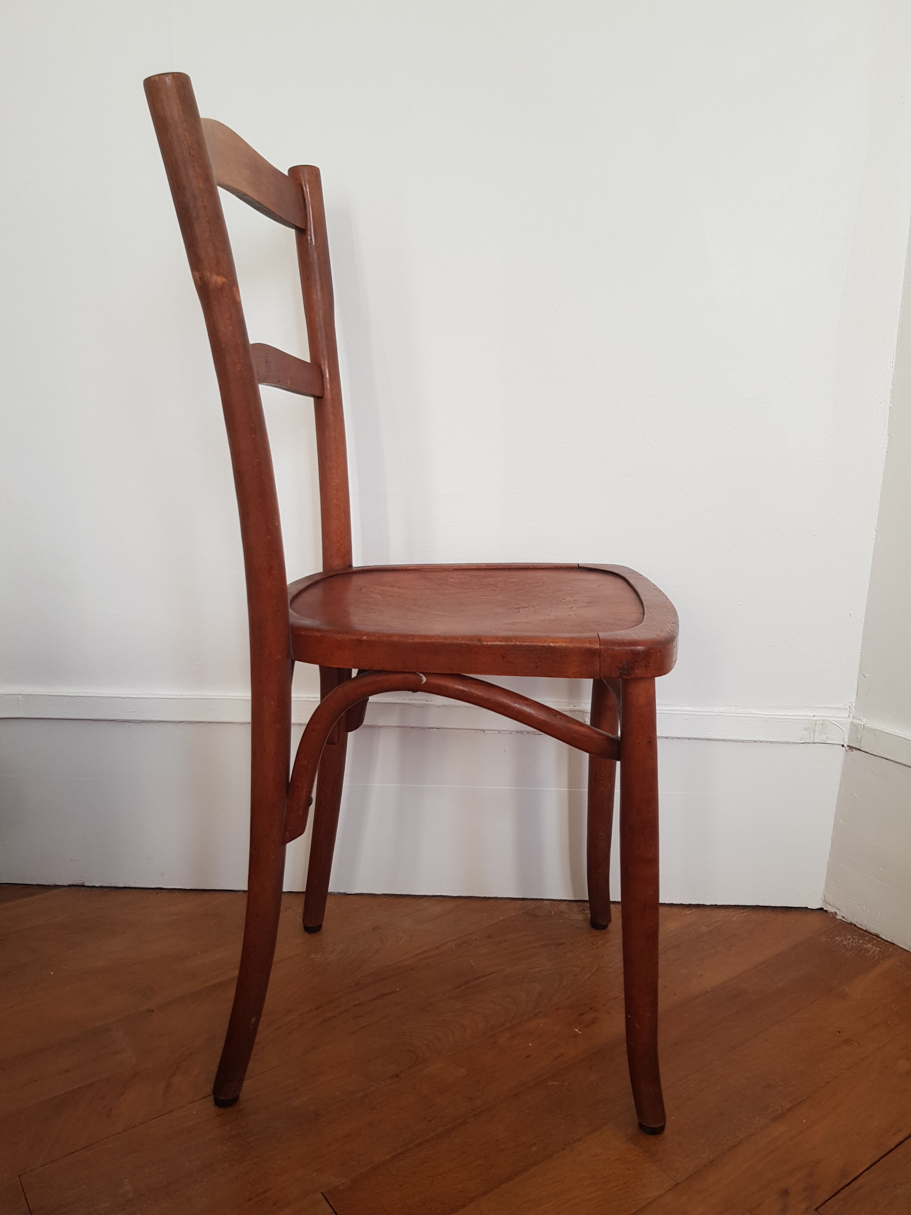 Curved wooden bistro chair