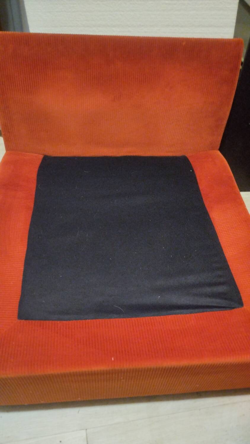 Set of three vintage armchairs. 1970s. Orange corduroy.