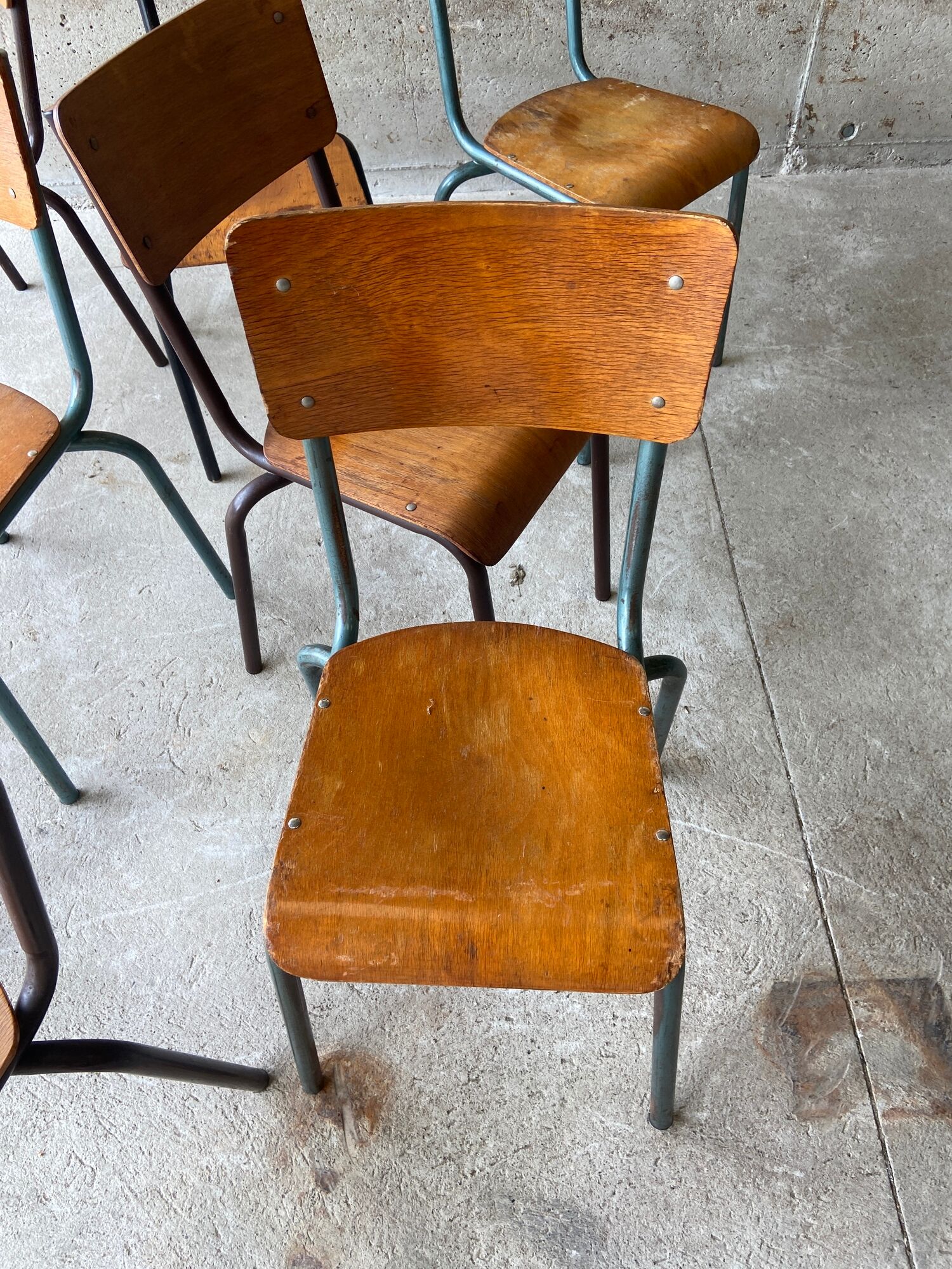 Set of 10 vintage mismatched industrial chairs mullca