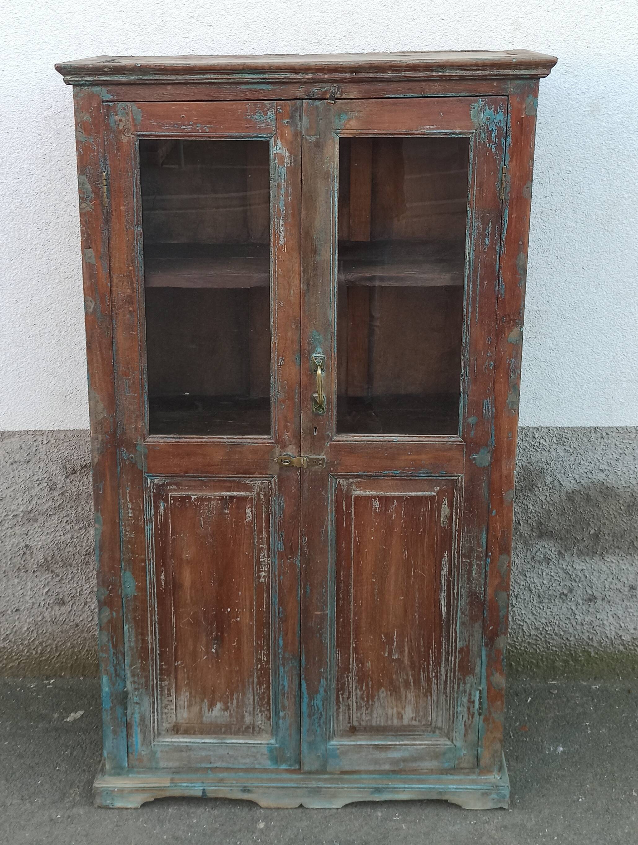 Old glazed wooden cabinet with beautiful patina