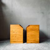 Pair of handcrafted solid wood bedside tables with drop-down doors.