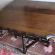 Antique farmhouse patinated extendable table in oak with carved edge, 1900