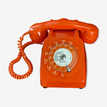 Téléphone à cadran vintage orange